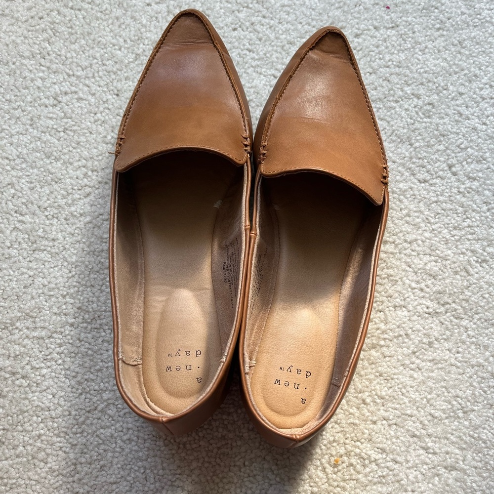 A new day flats. Worn a few times.